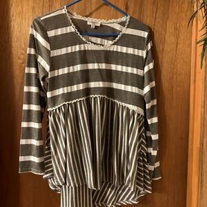 Boutique Brand Umgee top is so cute. Size m